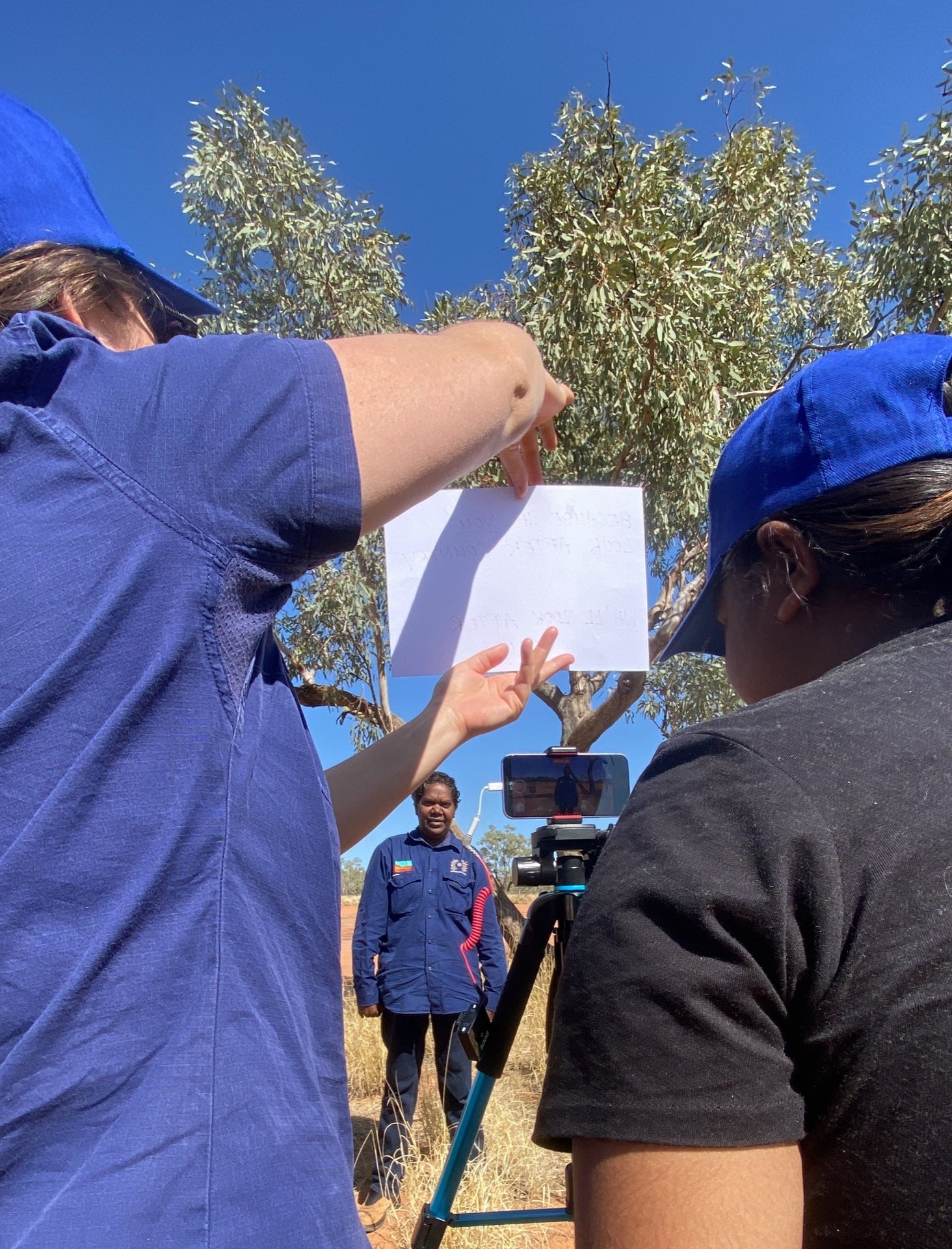 Central Land Council women rangers filming their own recruitment video on Country