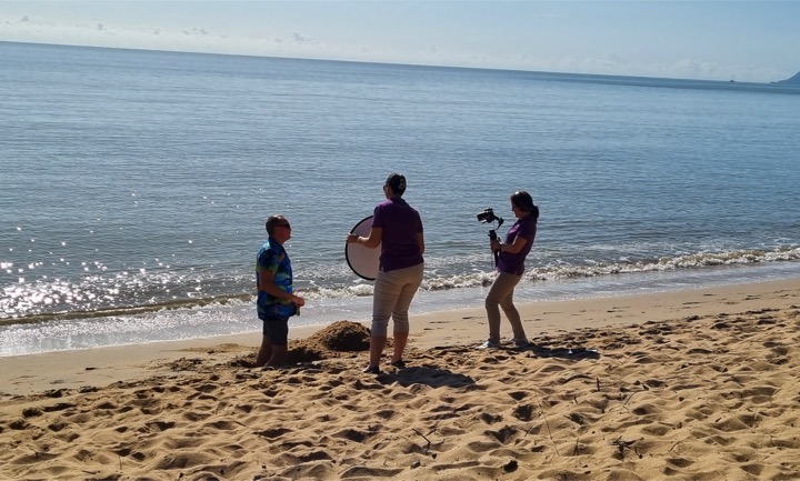 Filming a video production on a Queensland beach